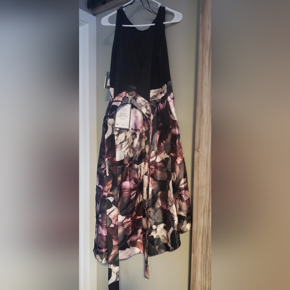 Formal high low dress. Floral and black with low back and attached sash for bow